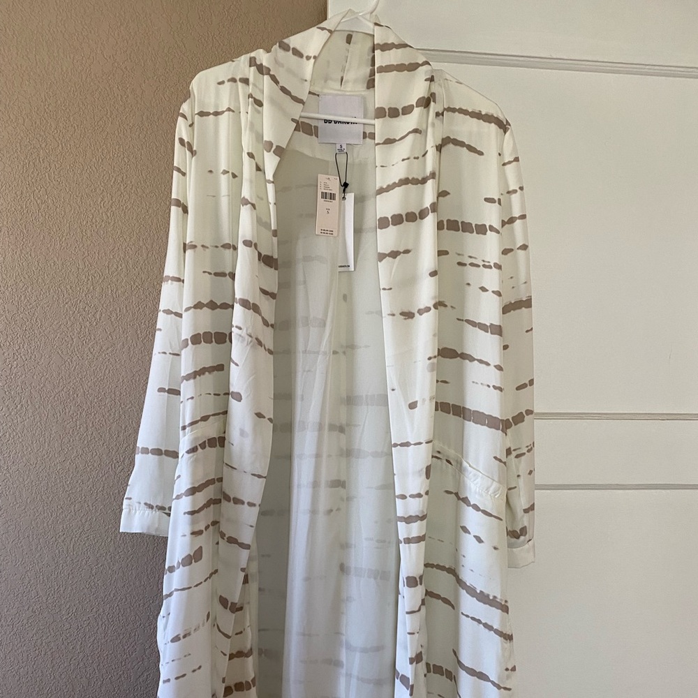 Brand new size S duster.